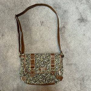 Messenger bag purse by Union Bay. Corduroy flower print and brown faux leather.